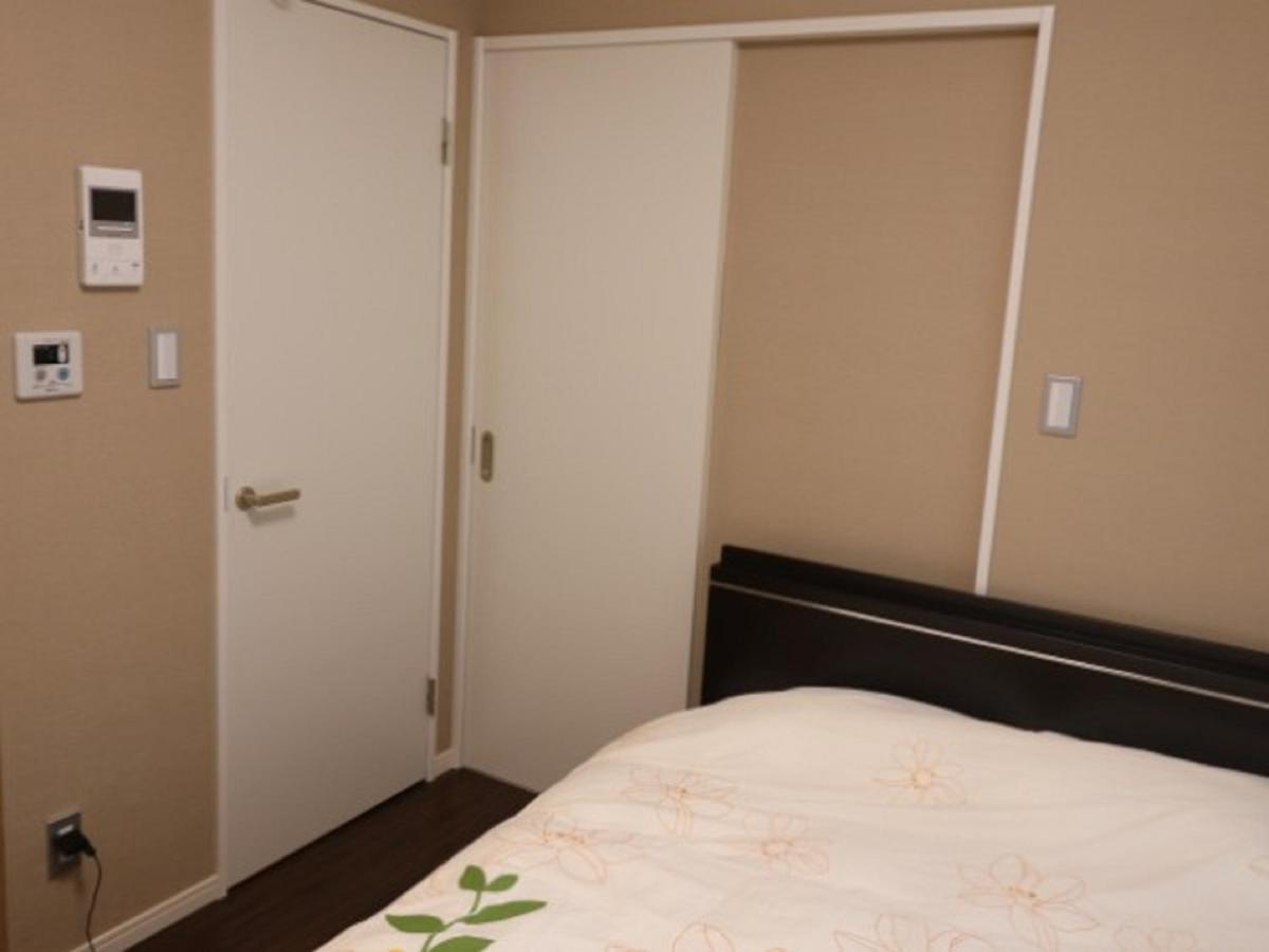 Mr. Kinjo In Makishi Aparthotel Наха Стая снимка