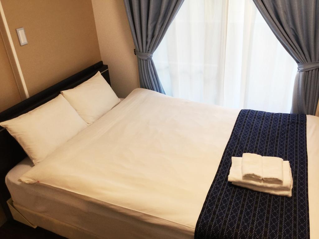 Mr. Kinjo In Makishi Aparthotel Наха Екстериор снимка